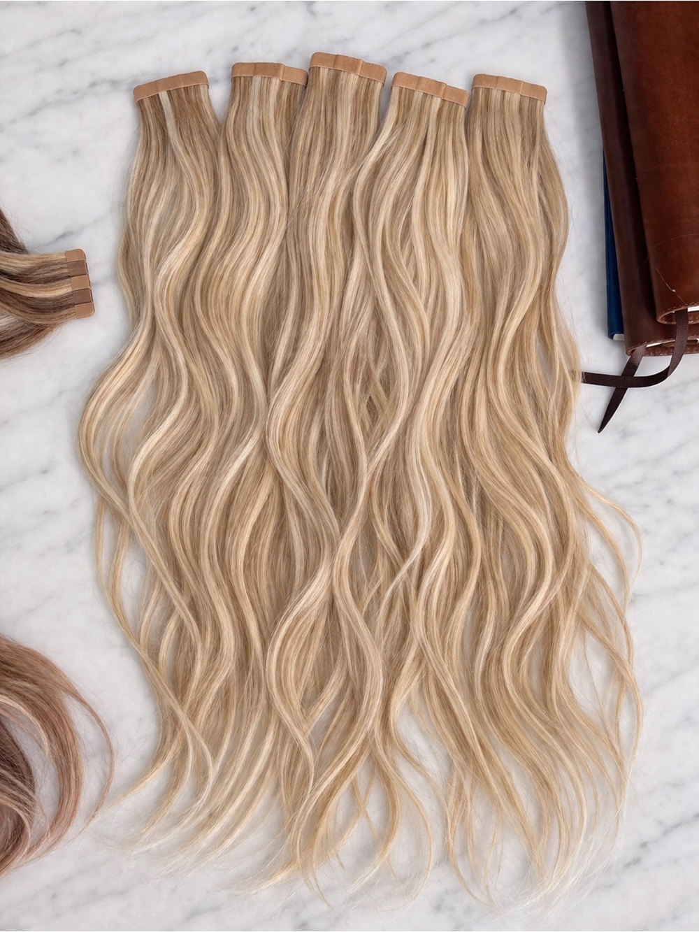 18” Bombay Blonde Tape-In Hair Extensions  5 packs. NEW- worn for a for a week.